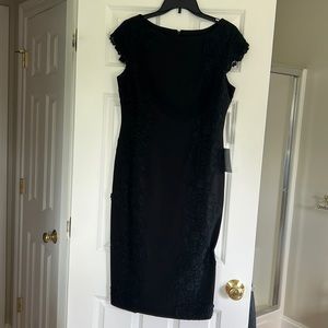 NWT: Stunning black dress with lace detail along front and shoulders